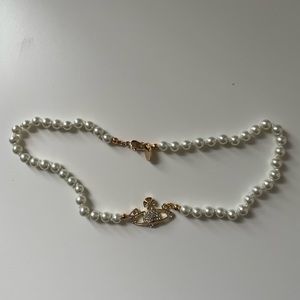 Saturn Pearl Necklace